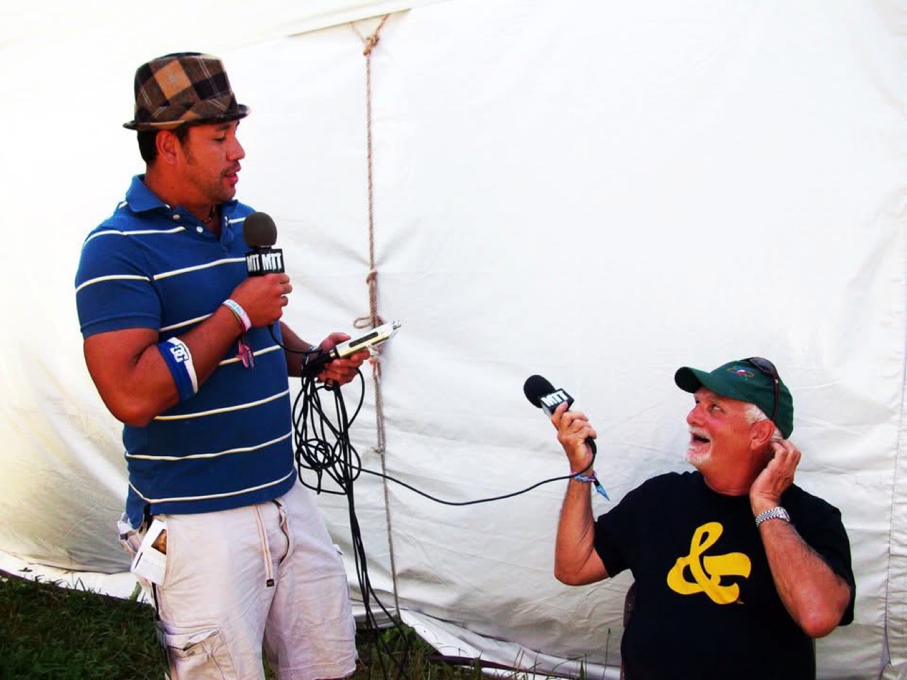 Moe Train interviewing Bill Kreutzmann, both holding Moe Train's Tracks mics