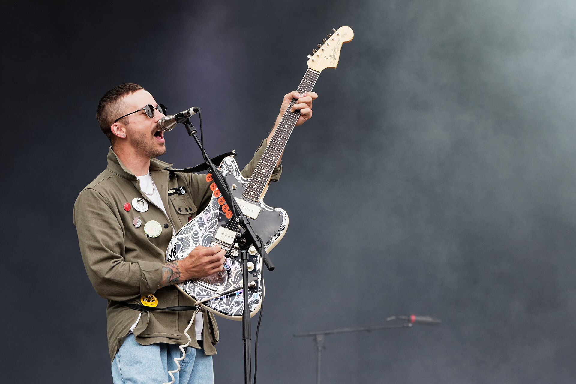 John Gourley of Portugal. The Man singing and playing guitar live