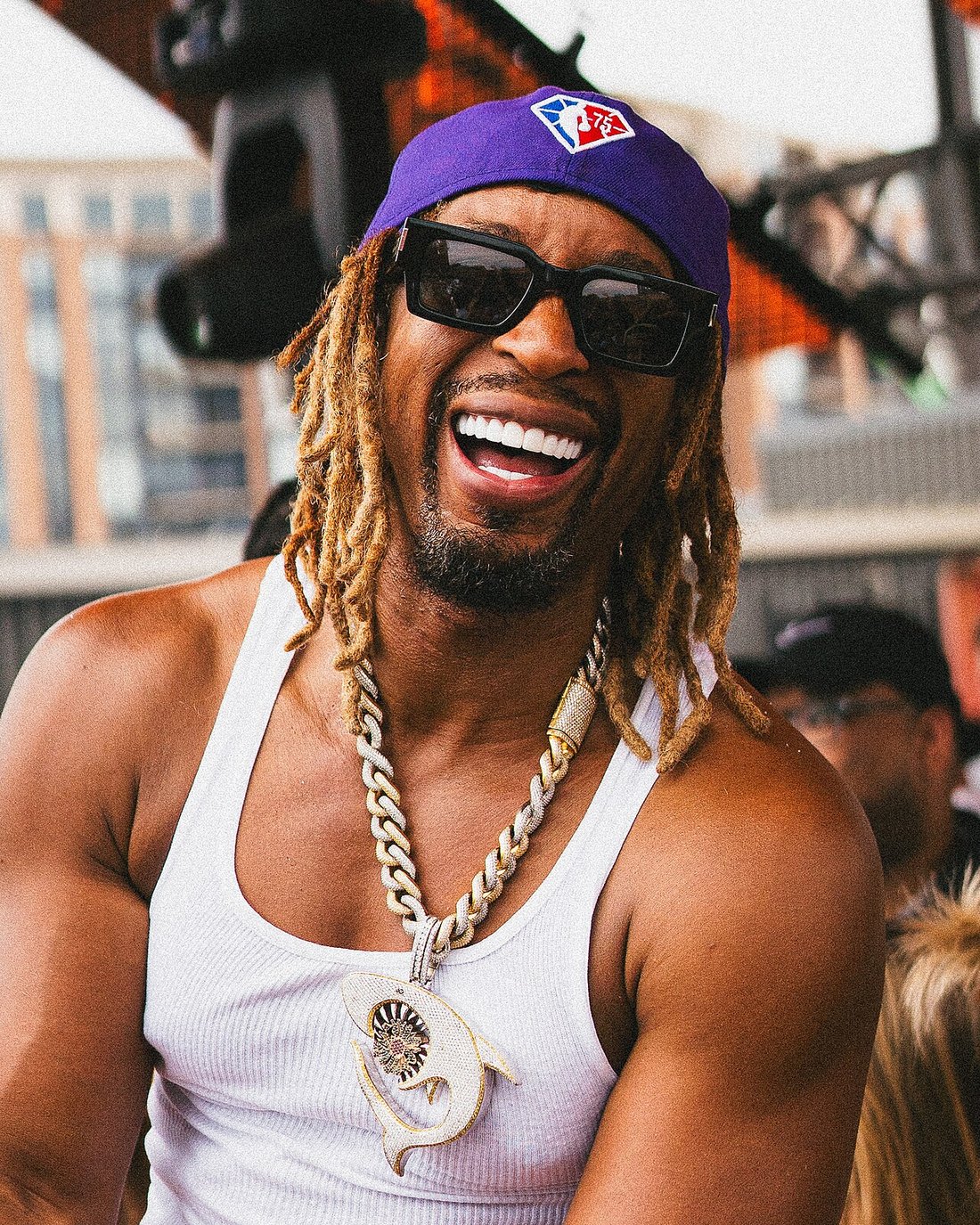 Lil Jon smiling at an outdoor event